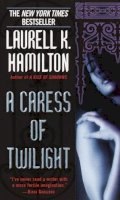 Laurell K. Hamilton - A Caress of Twilight (Meredith Gentry Novels) - 9780345423429 - V9780345423429